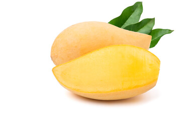 Ripe yellow Nam Dok Mai mango halved with green leaves. isolated on white background.