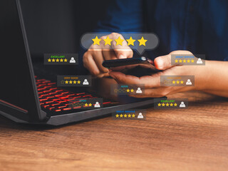 Man using a smartphone give the five-star icon a rating of very impressed for service