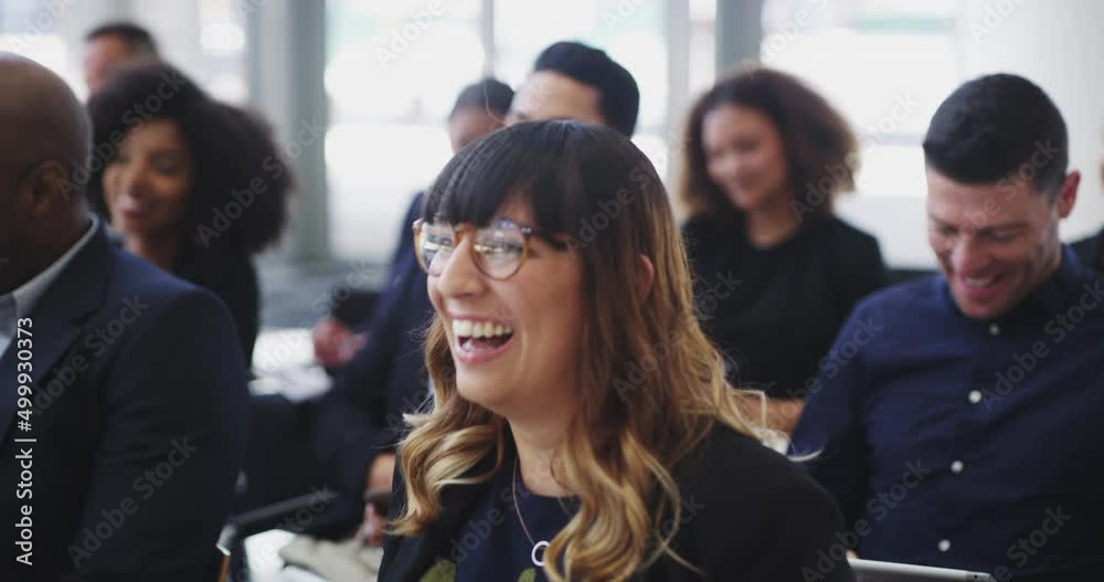 Aufkleber group of young diverse business people sitting in a conference room laughing while listening to a wo