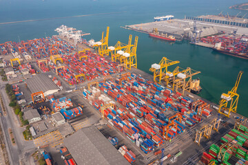 Aerial top view of container cargo ship in the export and import business and logistics international goods in urban city. Shipping to the harbor by crane in , Thailand
