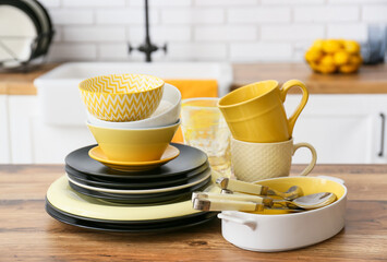 Modern dinnerware on counter in kitchen