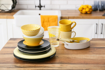 Modern dinnerware on counter in kitchen
