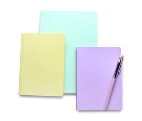 Notebooks and pen isolated on white