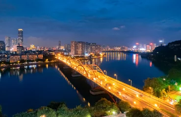 Foto op Plexiglas Night view of Wenhui Bridge in Liuzhou, Guangxi, China © Weiming