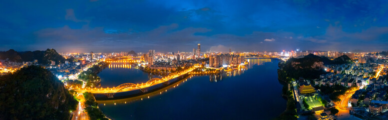 Fototapeta na wymiar Night view of Wenhui Bridge in Liuzhou, Guangxi, China