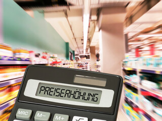 Ein Supermarkt, Taschenrechner und Preiserhöhung