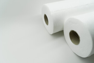 Universal white fabric napkins for cleaning in a roll. Bobbin with napkins for dispenser. Selective focus