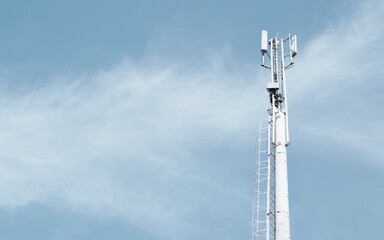 Telecommunication technologies. Modern mobile and satellite communication tower against blue sky on clear day outdoors, copy space