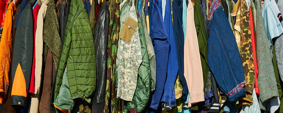 A row of jackets, coats and clothes