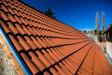 Red tiled roof at blue sky