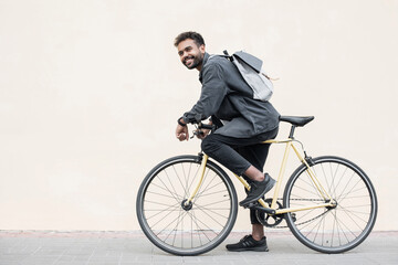 Handsome young man with bicycle in city, Smiling student men outdoor portrait, Active lifestyle,...