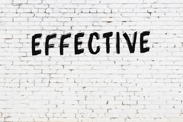 White wall with black paint inscription effective on it