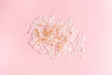 Sea salt texture close up on pink background
