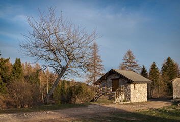 Fototapeta na wymiar Mountain landscape with stone house