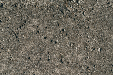 Close-up of the old concrete pavement. Dirty concrete floor. The texture of old concrete.