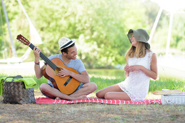 boyfriend rending song during picnic