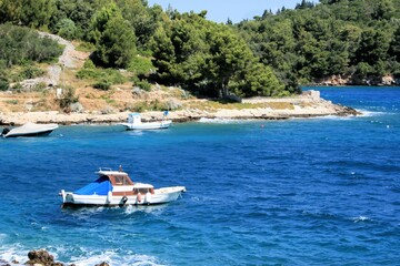 boat in the lovely Valdarke bay , island Losinj, Croatia