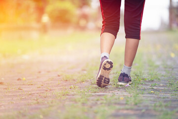 Jogging is also distinguished from running by having a wider lateral spacing of foot strikes,...