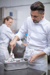man making natural ice cream