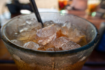 Ice on a colorful drink