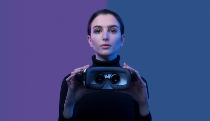 Woman showing a VR headset