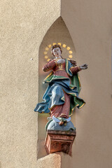 Fototapeta na wymiar Virgin Mary, statue on the main street of Miltenberg in Lower Franconia, Bavaria, Germany.