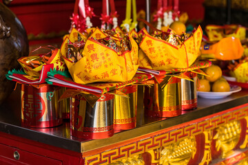 Bangkok, Thailand - January, 26, 2022 : Chinese traditional for burning pay respect to god or passed away ancestor's spirits for Chinese ceremony in Bangkok, Thailand.