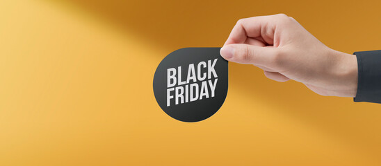 Hand holding a Black Friday promotional label