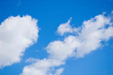 Obraz na płótnie Canvas Large clouds against blue sky.