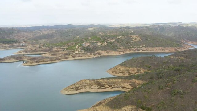 Drone image of a mountain range with a drainage basin.
