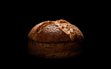 Fresh bread in dark studio