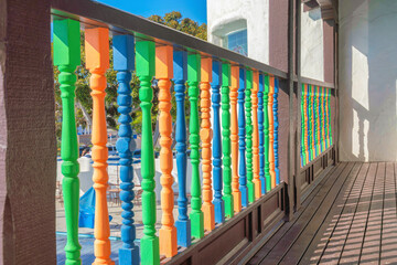 Railings of a deck with colorful baluster at San Clemente, California