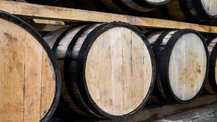 Oak barrels stacked with tequila ready for maturation