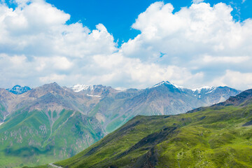 Fototapeta premium Grassland mountain and sky natural scenery