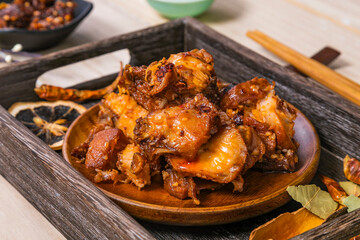 Rabbit meat on a wooden plate