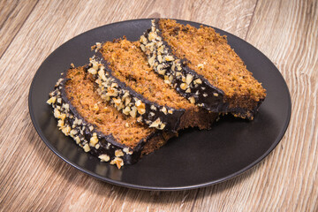 Pieces of zucchini dough with nuts and raisins. Delicious dessert