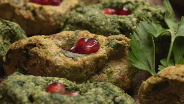 Slide shot of Georgian traditional food Pkhali, meal and dish with vegetables and pomegranate. Tbilisi,Georgia. High quality 4k footage