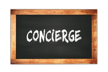 Fototapeta premium CONCIERGE text written on wooden frame school blackboard.