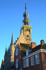 Fototapeta premium The Stadhuis (town hall) with its impressive clock tower in Veere, Zeeland, Netherlands