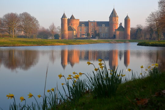 Reflections of Westhove Castle, located in the nature reserve de Manteling near Domburg, Zeeland, Netherlands