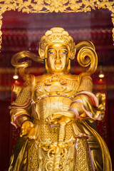 Bangkok, Thailand - March, 04, 2022 : Statue of the chinese god of wealth in Leng Noei Yi 2 or Mangkon Temple in Bangkok, Thailand.