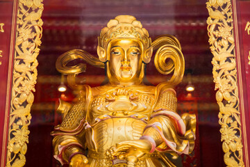 Bangkok, Thailand - March, 04, 2022 : Statue of the chinese god of wealth in Leng Noei Yi 2 or Mangkon Temple in Bangkok, Thailand.