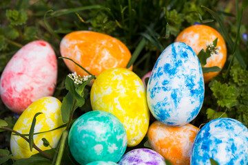 Happy Easter, colorful eggs and flowers.