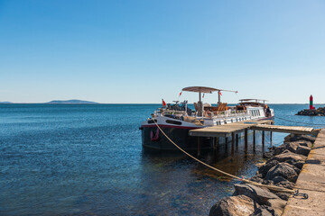 Fototapeta premium Barge at quay in Marseillan, in Hérault in Occitanie, France