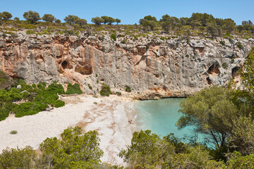 Fototapeta na wymiar Turquoise waters in Mallorca. Magraner cove. Mediterranean coastline. Balearic islands