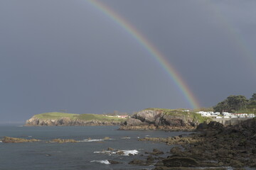 BEAUTIFUL RAINBOW OVER THE SEA