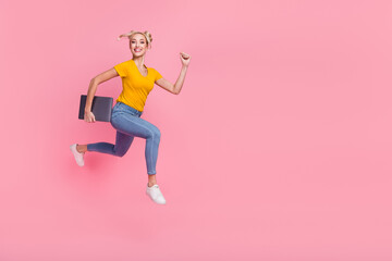 Fototapeta na wymiar Full size photo of attractive girl in casual denim wear running fast deadline hour isolated on pink color background