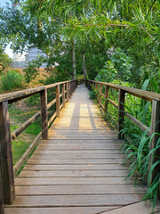 Wooden bridge over the river on the route of the mills in Alborache.