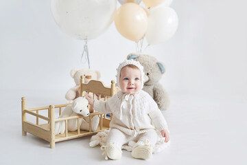 Obraz na płótnie Canvas Toddler boy birthday. Child with balloons and toys. Happy Birthday! Celebration First year baby.