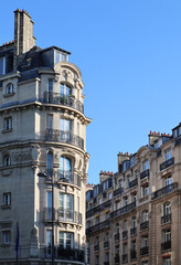Fototapeta na wymiar Beautiful facades of late 19th century Haussmann buildings in the 7th arrondissement of Paris